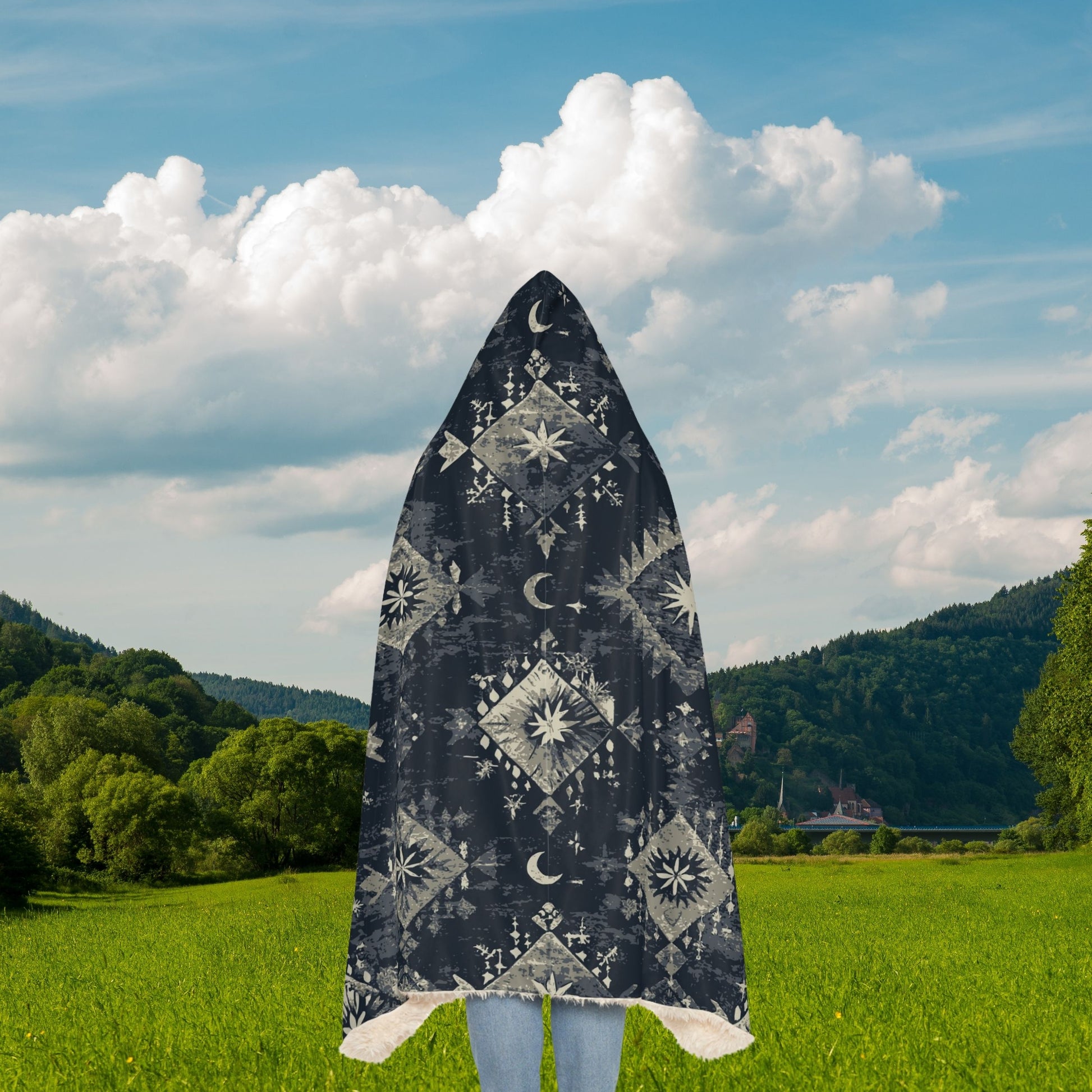 "Kilim pattern throw blanket in vibrant tribal design, folded neatly with hemmed edges"